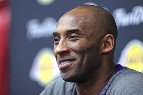 Los Angeles Lakers forward Kobe Bryant, speaks with members of the media, before his team's game against the Chicago Bulls, at the United Center, in Chicago, on Feb. 21, 2016.