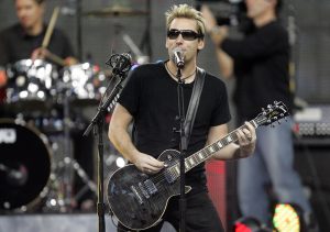 Nickleback lead singer Chad Kroeger performs during half time of the Thanksgiving Day game between the Detroit Lions and Green Bay Packers at Ford Field in Detroit, Michigan, Thursday November 24, 2011. (Kirthmon F. Dozier/Detroit Free Press/MCT)