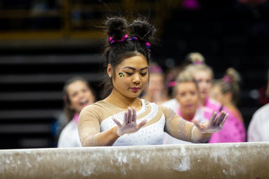 Iowa+gymnast+Clair+Kaji+prepares+to+begin+her+routine+on+the+balance+beam+during+the+Gymhawks+home+opener+on+Saturday%2C+Jan.+11%2C+2020+at+Carver-Hawkeye+Arena.++Kaji+led+the+Hawkeyes+in+the+beam+with+9.800+points.+With+195.550+points%2C+the+Hawkeyes+came+out+victorious+against+the+Ball+State+University+Cardinals%2C+who+came+in+second+with+192.775+points+%2C+and+the+U.S.+Air+Force+Academy+Falcons%2C+who+earned+188.650+points.