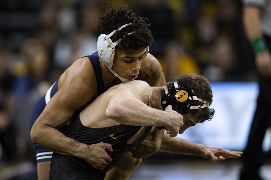 Iowa's Austin DeSanto wrestles Penn State's Roman Bravo-Young during a wrestling dual meet between No. 1 Iowa and No. 2 Penn State at Carver-Hawkeye Arena on Friday, Jan. 31, 2020. (Shivansh Ahuja/The Daily Iowan)