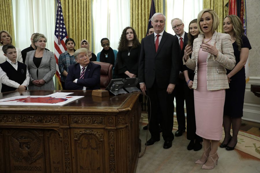 U.S. President Donald Trump listens to pastor Paula White during the Announcement of the Guidance on Constitutional Prayer in Public Schools in the the Oval Office at the White House on Jan. 16, 2020 in Washington, D.C. 