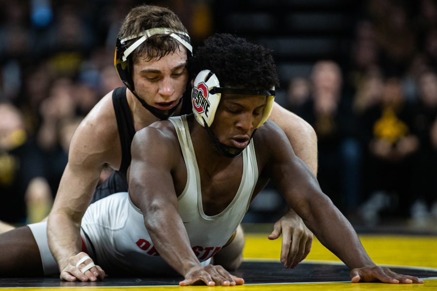 Iowa’s 133-pound Austin DeSanto wrestles Ohio State’s Jordan Decatur during a wrestling dual meet between No. 1 Iowa and No. 4 Ohio State at Carver-Hawkeye Arena on Friday, Jan. 24, 2020. No. 2 DeSanto defeated No. 18 Decatur by technical fall in 5:59, and the Hawkeyes defeated the Buckeyes, 24-10. (Shivansh Ahuja/The Daily Iowan)