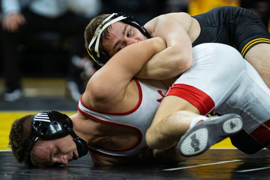 Iowas 125-pound Spencer Lee wrestles Nevraskas Alex Thomsen during a wrestling dual meet between Iowa and Nebraska at Carver-Hawkeye Arena on Saturday, Jan. 18, 2020. Lee won by technical fall in 2:56, and the Hawkeyes defeated the Huskers, 26-6. (Shivansh Ahuja/The Daily Iowan)