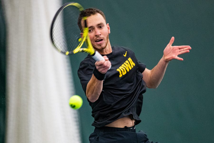 Iowas Kareem Allaf hits a forehand during a mens tennis match between Iowa and Texas Tech at the HTRC on Thursday, Jan. 16, 2020. The Red Raiders defeated the Hawkeyes, 4-3.