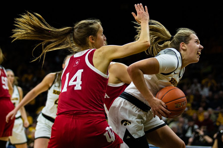 Iowa guard Kathleen Doyle drives to the board during a womens basketball match between Iowa and Indiana at Carver-Hawkeye Arena on Sunday, Jan. 12, 2020. The Hawkeyes defeated the Hoosiers, 91-85, in double overtime. 