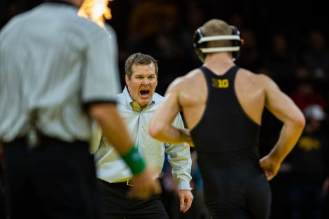 Iowa head coach Tom Brands yells during a wrestling dual meet between Iowa and Nebraska at Carver-Hawkeye Arena on Saturday, Jan. 18, 2020. The Hawkeyes defeated the Huskers, 26-6.