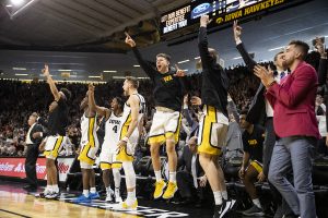 Members of the Iowa men’s basketball team react to the game during a men’s basketball game between the Iowa Hawkeyes and the Illinois Fighting Illini on Sunday, February 2, 2020. The Hawkeyes defeated the Fighting Illini 72-65. 