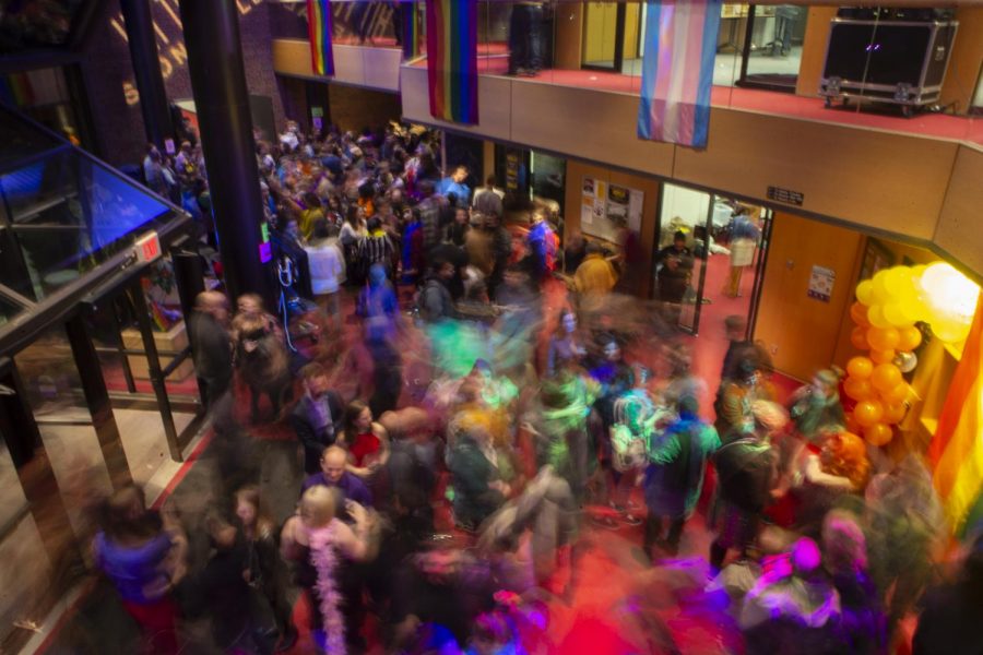 Attendees are seen at the Stonewall 50th Anniversary Celebration held in the Theatre Building on Friday, Jan. 31, 2020. After the opening performance of Hit the Wall at Hancher Auditorium, audience members were encouraged to join in on the celebrations to commemorate the 50th anniversary of the riots that sparked the LGBTQ+ movement. (Hannah Kinson/The Daily Iowan) 