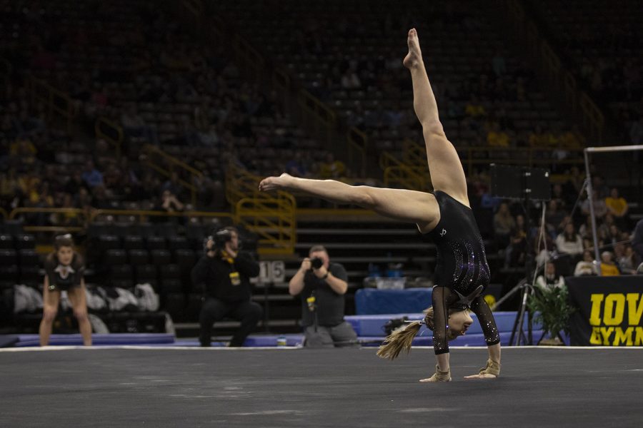 Iowa’s Lauren Guerin performs her floor routine during a gymnastics meet at Carver Hawkeye Arena against Michigan State on Saturday, Feb. 1, 2020. The Hawkeyes won three out of four events against the Spartans with a score, 195.450-195.275. Guerin earned a score of 9.875. 