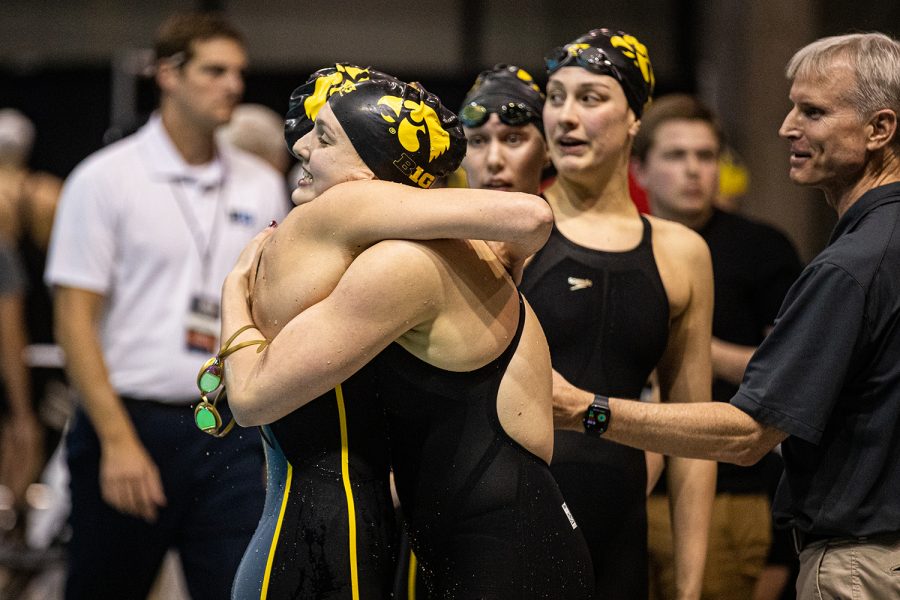 Iowa+swimmers+embrace+each+other+after+the+800+Free+Relay+during+the+first+session+of+the+2020+Big+Ten+Womens+Swimming+and+Diving+Championships+at+the+HTRC+on+Wednesday%2C+Feb.+19%2C+2020.+
