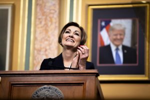 Gov. Kim Reynolds smiles during the Condition of the State address at the Iowa State Capitol on Tuesday, Jan. 14, 2020. 