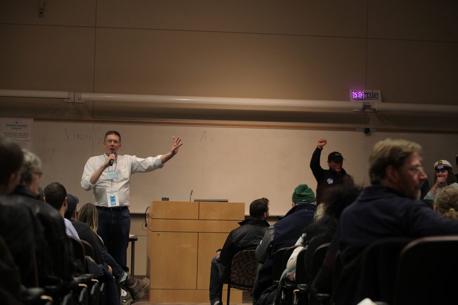 An Iowa caucus leader speaks to the audience during the caucus on February 1st, 2016. The caucus held supporters of Bernie Sanders, Hillary Clinton, and Martin OMalley. 