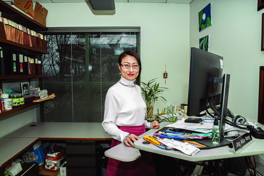 University of Iowa Marketing Professor Alice Wang poses for a portrait in the Pappajohn Business Building on Feb. 17, 2020. Researchers in the Tippie College of Business have connected hoarding to the feeling of loneliness. 
