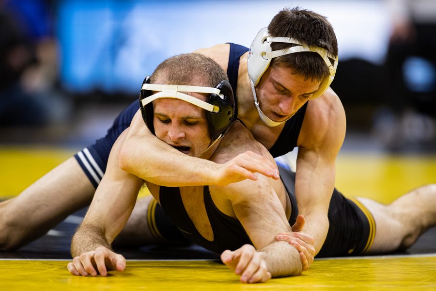 Iowa%E2%80%99s+141-pound+Carter+Happel+wrestles+Penn+State%E2%80%99s+Nick+Lee+during+a+wrestling+dual+meet+between+No.+1+Iowa+and+No.+2+Penn+State+at+Carver-Hawkeye+Arena+on+Jan.+31.+No.+2+Lee+defeated+Happel+by+technical+fall+in+5%3A53%2C+and+the+Hawkeyes+defeated+the+Nittany+Lions%2C+19-17.