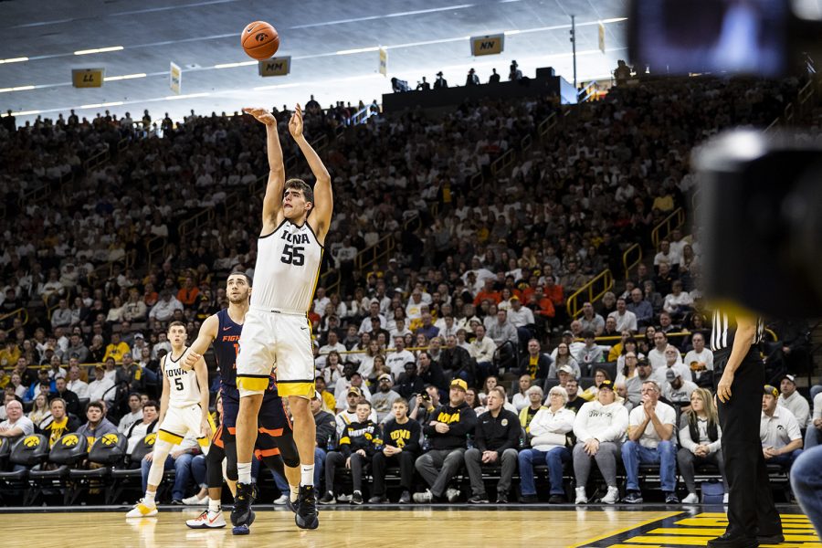 Iowa men’s basketball center Luka Garza goes in for a shot during a men’s basketball  game against Illinois at Carver-Hawkeye Arena on Sunday, February 2. The Hawkeyes defeated the Fighting Illini 72-65. (Nichole Harris/The Daily Iowan)