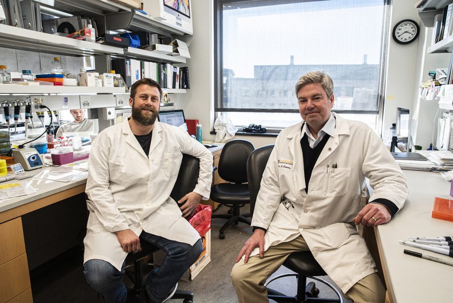 Research scientist, Scott Ebert, and University of Iowa Professor, Chis Adams pose for a portrait in the Papajohn Biomedical Institute on Tuesday, Feb. 11, 2020. Adams’ research focuses on how diabetes and obesity affect muscular atrophy. He and his research team has removed a specific gene in mice to affects the disease. 