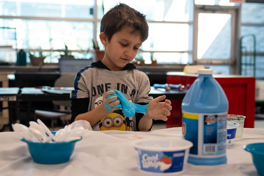 Alex Butler, 7, plays with putty in the Makers Space at the Robert A. Recreation Center on Thursday, Feb. 6, 2020.
