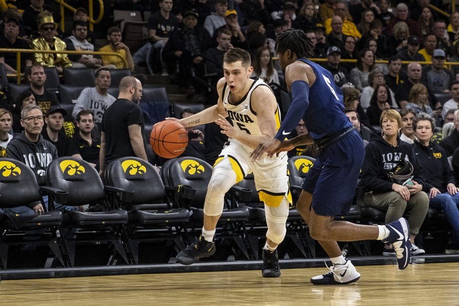 Iowa+guard+CJ+Fredrick+drives+to+the+hoop+during+a+men%E2%80%99s+basketball+game+between+Iowa+and+Penn+State+on+Saturday%2C+Feb.+29+at+Carver-Hawkeye+Arena.+The+Hawkeyes+defeated+the+Nittany+Lions+77-68.+%28Nichole+Harris%2FThe+Daily+Iowan%29