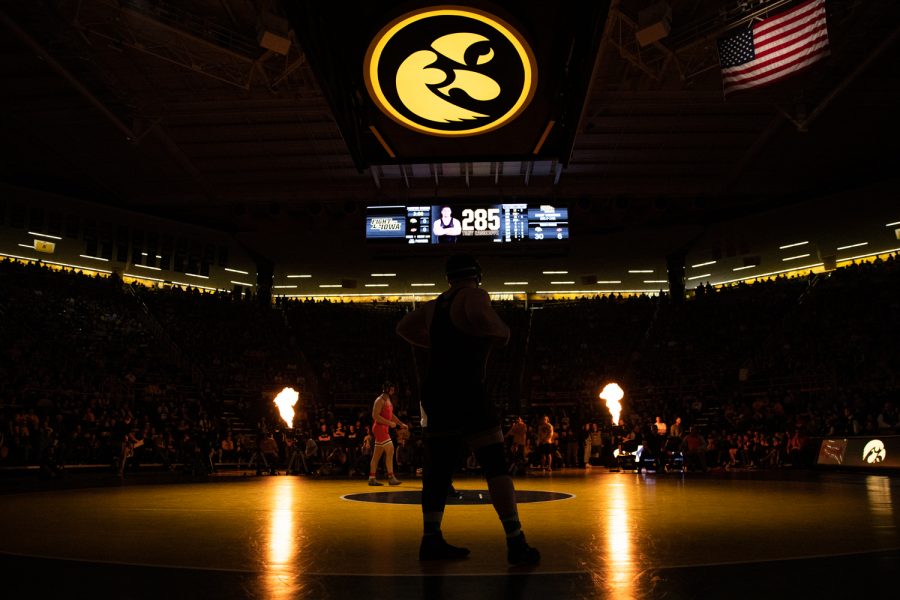 Iowa’s 285-pound Tony Cassioppi grapples with Oklahoma State’s Austin Harris during a wrestling dual meet between No. 1 Iowa and No. 9 Oklahoma State at Carver-Hawkeye Arena on Sunday, Feb. 23, 2020. No. 3 Cassioppi defeated Harris by major decision, 11-1, and the Hawkeyes defeated the Cowboys, 34-6.