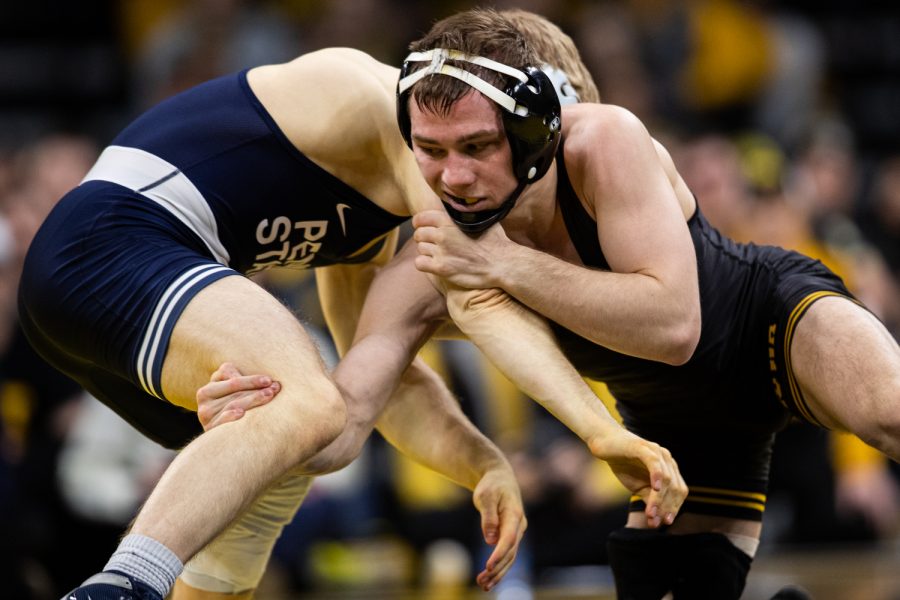 Iowa’s 125-pound Spencer Lee wrestles Penn State’s Brandon Meredith during a wrestling dual meet between No. 1 Iowa and No. 2 Penn State at Carver-Hawkeye Arena on Friday, Jan. 31, 2020. No. 1 Lee won by technical fall in 3:18, and the Hawkeyes defeated the Nittany Lions, 19-17.