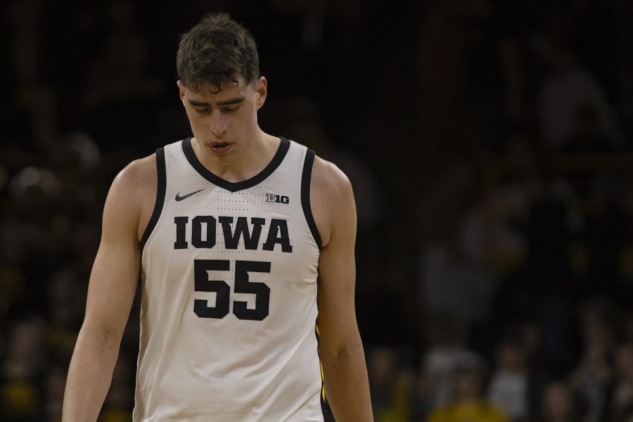Iowa center Luka Garza walks off the court after a mens basketball game between Iowa and Purdue at Carver Hawkeye Arena on Tuesday, March 3, 2020. The Hawkeyes were defeated by the Boilermakers, 77-68. 