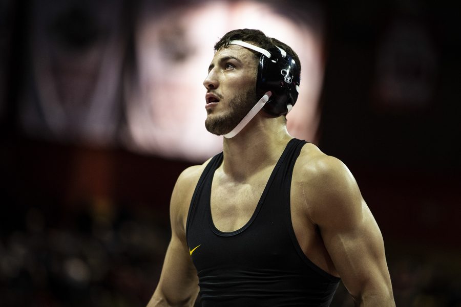 Iowas 174-pound Michael Kemerer looks out at the crowd while grappling with Minnesotas Devin Skatzka during session two of the Big Ten Wrestling Tournament in Piscataway, NJ on Saturday, March 7, 2020. Kemerer won by major decision, 22-9. 