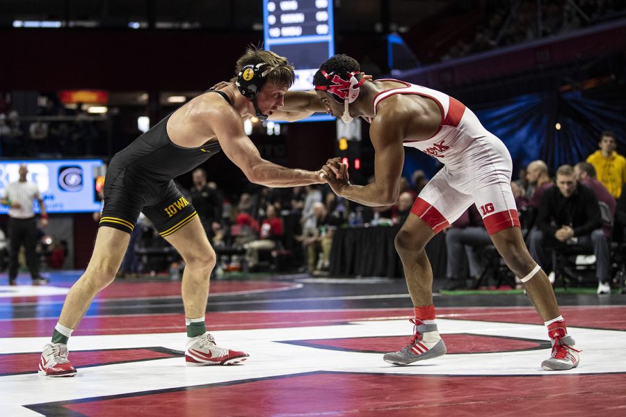 Iowas 141-pound Max Murin grapples with Nebraskas  Chad Red during session three of the Big Ten Wrestling Tournament in Piscataway, NJ on Sunday, March 8, 2020. Red won by decision, 3-1, and Murin placed fifth in the tournament 