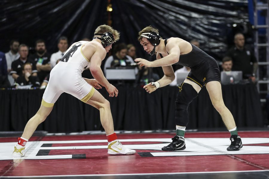 Iowa's 125-pound Spencer Lee grapples with Purdue's  Devin Schroder during the final session of the Big Ten Wrestling Tournament in Piscataway, NJ, on Sunday, March 8, 2020. Lee won by major decision 16-2, securing the 125-pound championship, and Iowa won the team title with 157.5 points. 