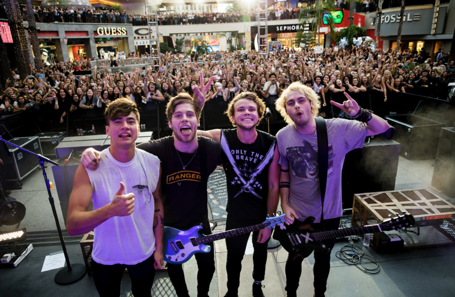 Australian pop band 5 Seconds of Summer members Calum Hood, Luke Hemmings, Ashton Irwin and Michael Clifford, from left, following their performance at Hollywood & Highland Center in promotion of their new album, Sounds Good, Feels Good, on Oct. 23, 2015 on Hollywood, Calif. 