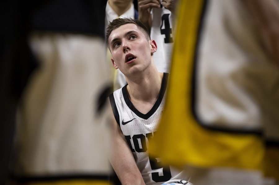 Iowa+guard+CJ+Fredrick+listens+intently+during+a+timeout+during+a+men%E2%80%99s+basketball+game+between+Iowa+and+Penn+State+on+Saturday%2C+Feb.+29+at+Carver-Hawkeye+Arena.+The+Hawkeyes+defeated+the+Nittany+Lions+77-68.+