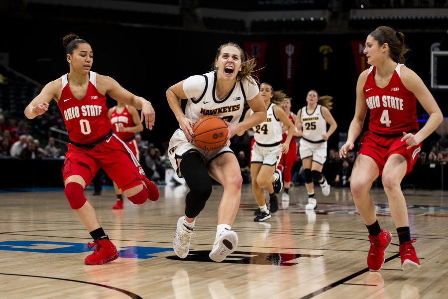 Iowa guard Kathleen Doyle drives the ball during the Iowa vs. Ohio State Womens Big Ten Tournament game at Bankers Life Fieldhouse in Indianapolis on Friday, March 6, 2020. The Buckeyes defeated the Hawkeyes 87-66.
