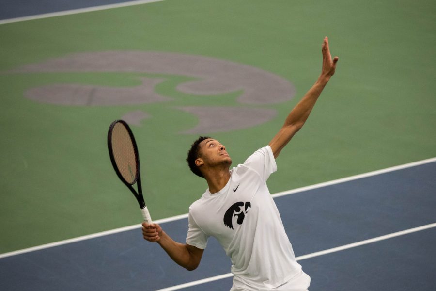 Oliver+Okonkwo+serves+during+a+mens+tennis+match+between+Iowa+and+Cornell+at+the+HTRC+on+Sunday%2C+Mar.+8%2C+2020.+Iowa+defeated+Cornell+4-3.+