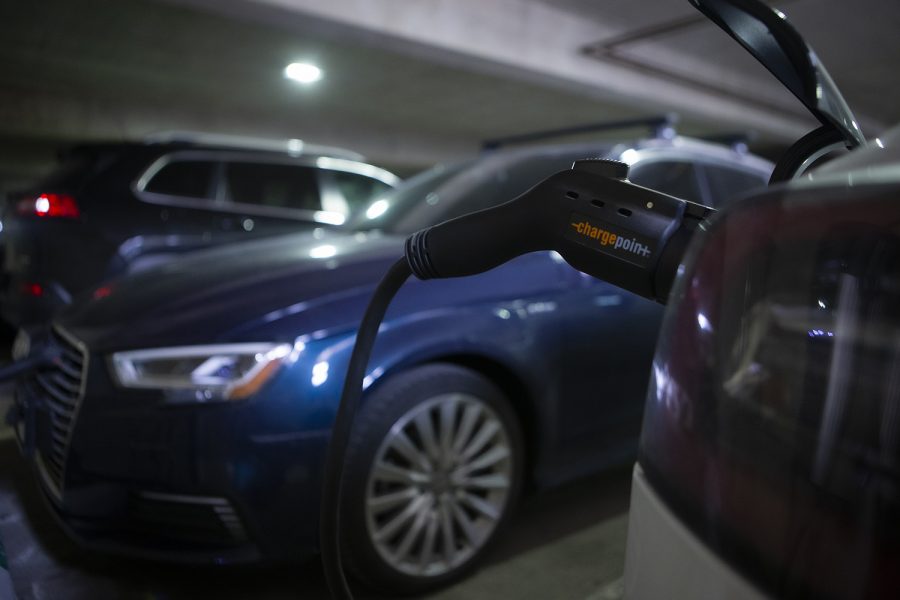 Two cars recharge at the station in the Court Street Transportation Center on Monday, February 24, 2020. The new stations recharge electric vehicles for a maximum of four hours. 