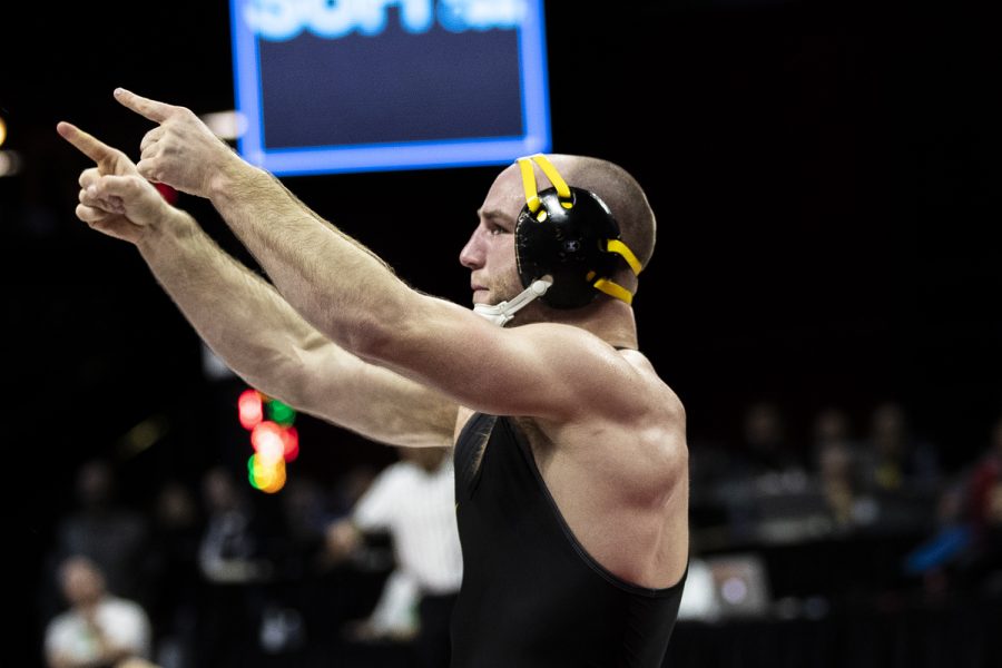 Iowas 165-pound Alex Marinelli grapples with Northwesterns  Shayne Oster during session two of the Big Ten Wrestling Tournament in Piscataway, NJ on Saturday, March 7, 2020. Marinelli won by fall in 2:41. (Nichole Harris/The Daily Iowan)