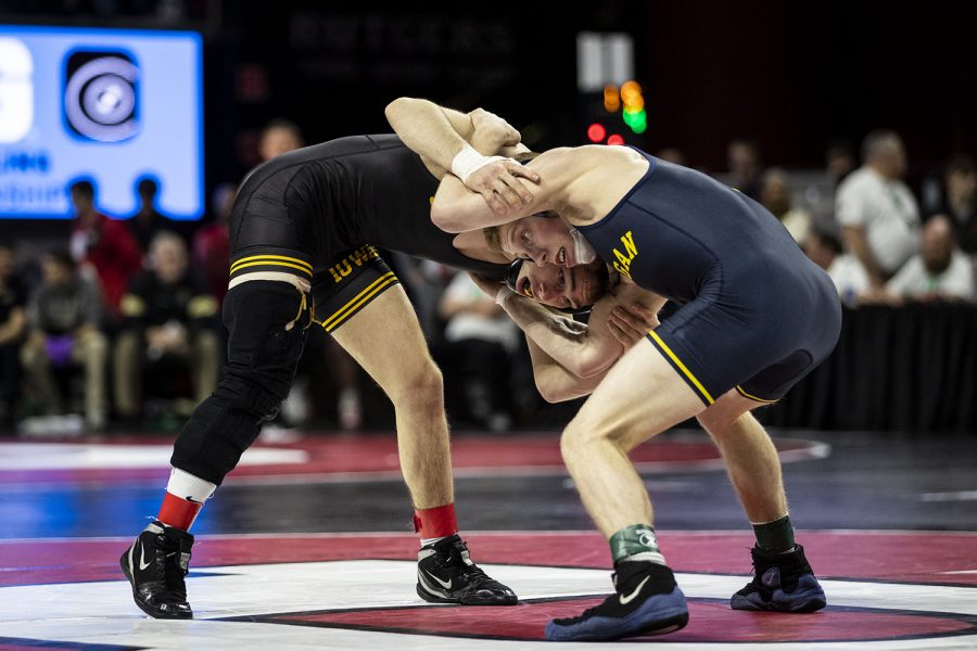 Iowas 125-pound Spencer Lee grapples with Michigans  Jack Medley during session two of the Big Ten Wrestling Tournament in Piscataway, NJ on Saturday, March 7, 2020. Lee won by tech fall in 3:23. 