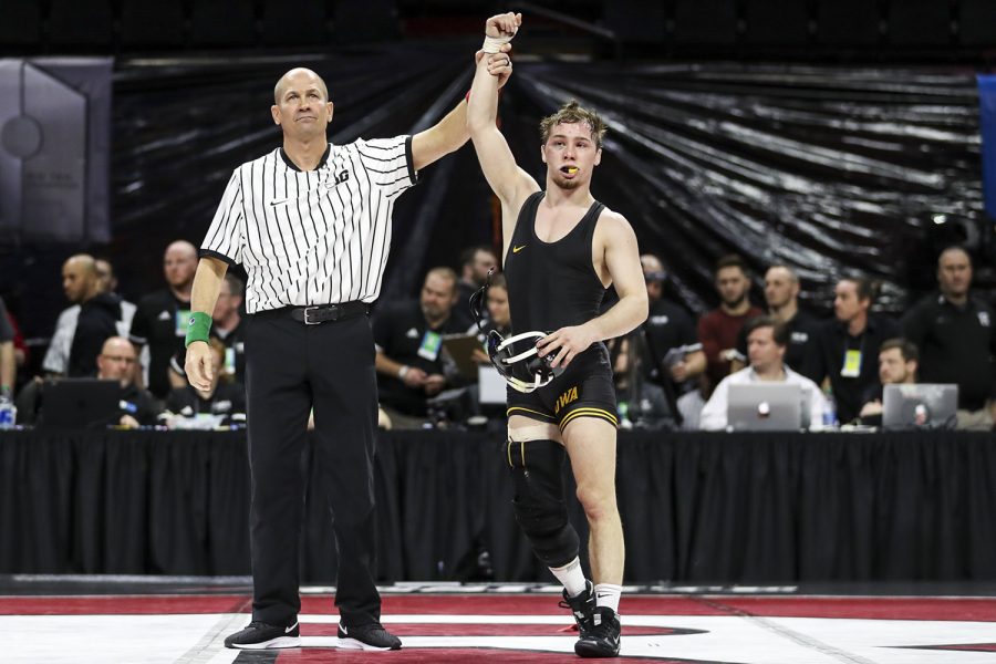 Iowas 125-pound Spencer Lee grapples with Purdues  Devin Schroder during the final session of the Big Ten Wrestling Tournament in Piscataway, NJ, on Sunday, March 8, 2020. Lee won by major decision 16-2, securing the 125-pound championship, and Iowa won the team title with 157.5 points. 