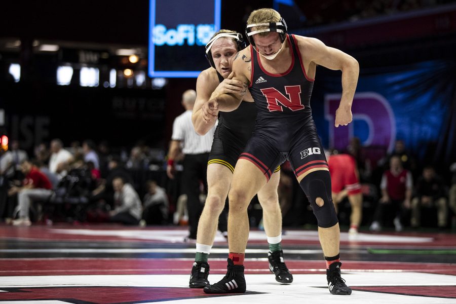 Iowas+157-pound+Kaleb+Young+grapples+with+Nebraskas+Peyton+Robb+during+session+one+of+the+Big+Ten+Wrestling+Tournament+in+Piscataway%2C+NJ+on+Saturday%2C+March+7%2C+2020.+Robb+won+by+decision+3-2.+%28Nichole+Harris%2FThe+Daily+Iowan%29
