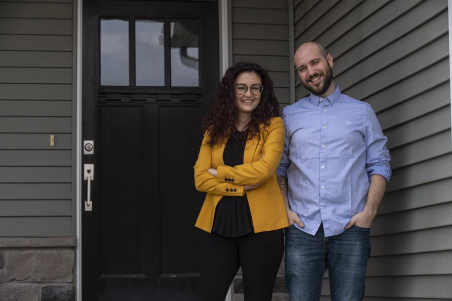 Caterina Lamuta (left) and Venanzio Cichella (right) pose for a portrait in front of their home on Saturday, April 25, 2020. Both mechanical engineering professors at the University of Iowa, the couple is a part of the team working to create a new robotic rehabilitation device. 