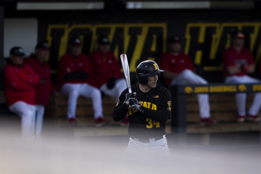 Iowa catcher Austin Martin watches the pitch during a baseball game between Iowa and Grand View at Duane Banks Field on March 3, 2020. The Hawkeyes defeated the Vikings 15-2.