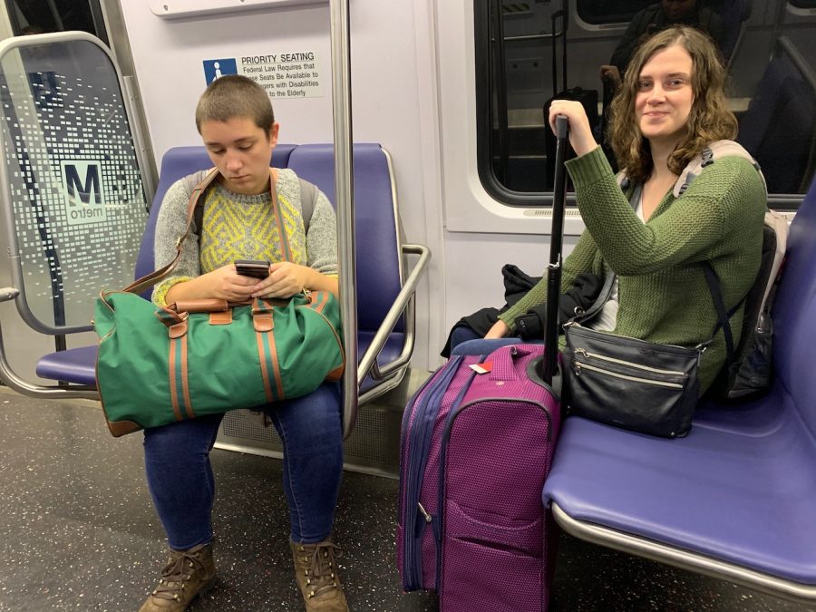 Brooklyn Draisey and Marissa Payne board a Metro train in Washington on Oct. 31, 2019 as they traveled to the National College Media Convention. It had been quite a trip, as it snowed in October and delayed their flight to the nations capital. To compensate, Payne bought overpriced airport mimosas for her and Draisey.