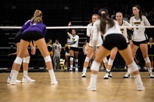 Iowa setter Brie Orr serves the ball during a volleyball match between Iowa and Washington at Carver Hawkeye Arena on Saturday, September 7, 2019. The Hawkeyes were defeated by the Huskies, 3-1.