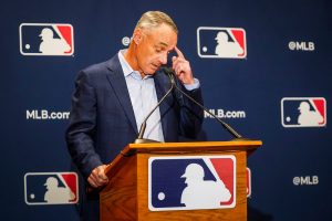 Major League Baseball commissioner Rob Manfred addresses reporters during MLB Media Day activities on Tuesday, Feb. 18, 2020, in Scottsdale, Ariz.