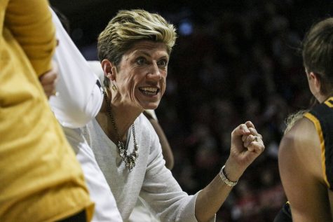 Iowa associate head coach Jan Jensen rallies the Iowa Hawkeyes during a timeout pep talk during a women’s basketball game between Iowa and Nebraska at Pinnacle Bank Arena in Lincoln, Nebraska on Saturday, December 28. The Hawkeyes fell to the Huskers 78-69.