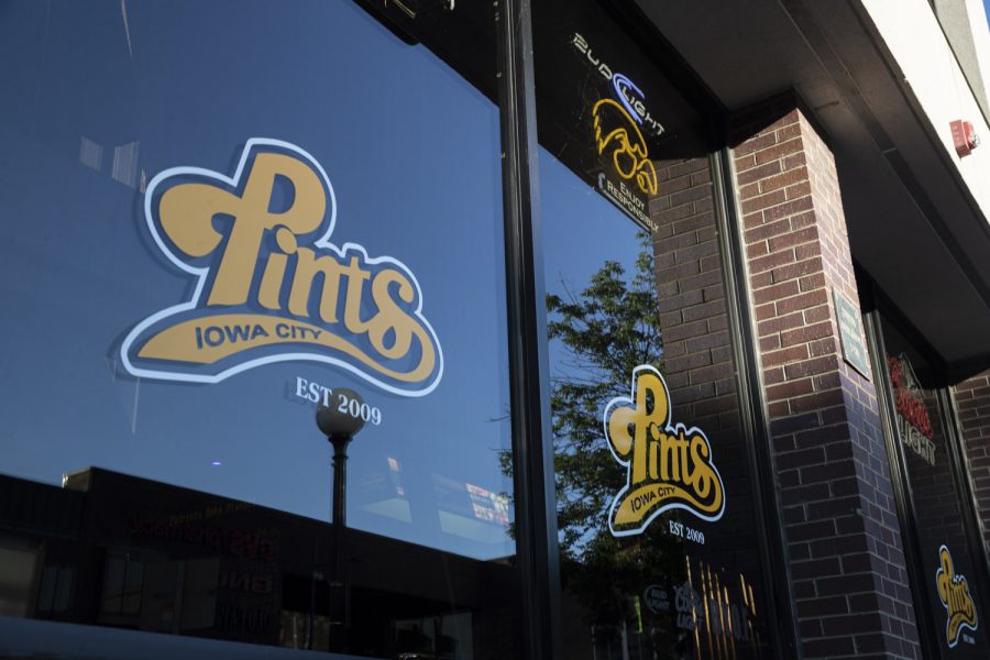 The front window of Pints is seen on June 25 in Iowa City. (Jake Maish/The Daily Iowan)