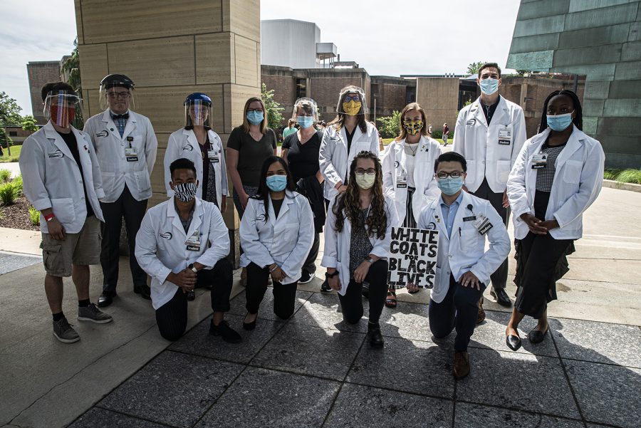 A class from the College of Pharmacy poses for a portrait at the Medical Education Research Facility for White Coats for Black Lives on Friday, June 5th, 2020. The medical community silently knelt for ten minutes in honor of Breonna Taylor and to protest systemic racism. 