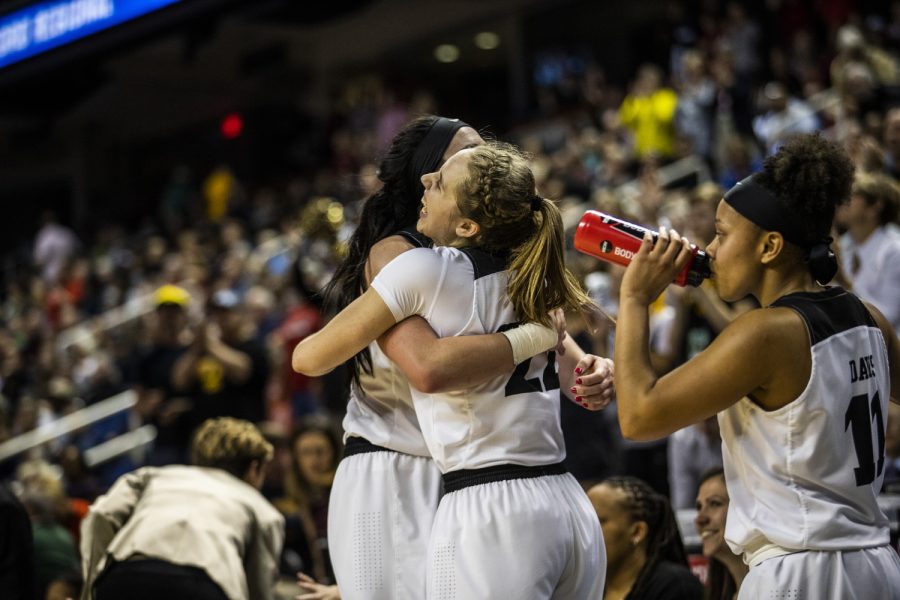 Iowa+center+Megan+Gustafson+and+guard+Kathleen+Doyle+hug+after+the+win+against+NC+State+in+the+NCAA+Sweet+16+game+at+the+Greensboro+Coliseum+Complex+on+Saturday%2C+March+30%2C+2019.+The+Hawkeyes+defeated+the+Wolfpack+79-61.