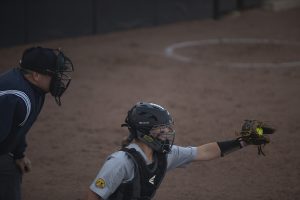Iowa catcher Kit Rocco catches a pitch during an Iowa softball game against Iowa Central at Pearl Field on Friday, October 4, 2019. The Hawkeyes defeated the Tritons 4-0 in 10 innings.