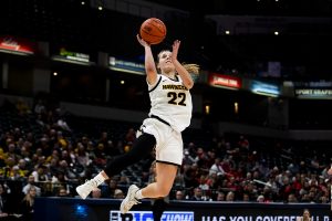 Iowa guard Kathleen Doyle jumps for a lay-up during the Iowa vs. Ohio State Womens Big Ten Tournament game at Bankers Life Fieldhouse in Indianapolis on Friday, March 6, 2020. The Buckeyes defeated the Hawkeyes 87-66.