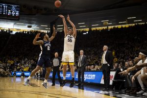 Iowa center Luka Garza takes a shot during a men’s basketball game between Iowa and Penn State on Saturday, Feb. 29 at Carver-Hawkeye Arena. The Hawkeyes defeated the Nittany Lions 77-68.