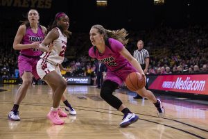 Iowa guard Kathleen Doyle takes the ball to the hoop during a women’s basketball between Iowa and Wisconsin at Carver-Hawkeye Arena on Sunday, Feb. 16, 2020. The Hawkeyes defeated the Badgers 97-71. (Nichole Harris/The Daily Iowan)
